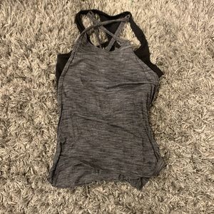 Black and grey women’s Lululemon workout tank top